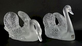 Pair of Lalique France frosted and clear crystal swan figures, head up and head down.
