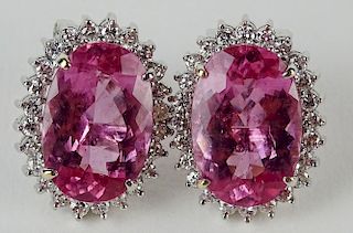 Pair of lady's approx. 12.50 carat oval cut pink tourmaline, 1.45 carat diamond and 18 karat white gold earrings.