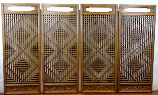 Four (4) Antique Chinese carved poplar open work door panels.