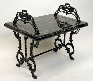 Modern black cast iron and black marble tea table.