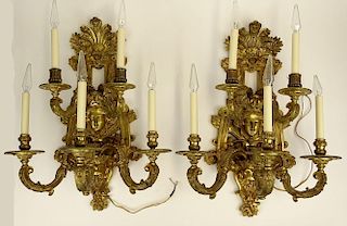 Pair of antique figural ormolu four (4) light sconces. Very ornate.
