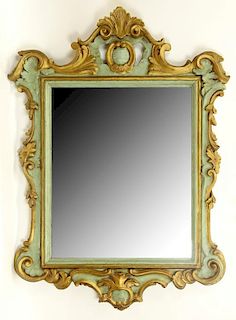 Early 20th Century Italian Florentine Carved Painted and Parcel Gilt Mirror.