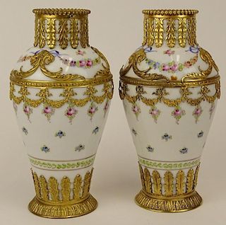 Pair of 19/20th century French Sevres gilt bronze mounted porcelain vases.