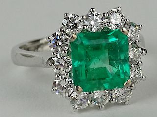 Stone Group Laboratories certified approx. 12.02 carat emerald cut Colombian emerald