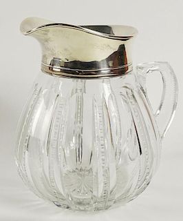 Sterling mounted crystal pitcher.