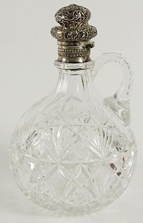 Antique Gorham silver mounted cut crystal claret jug.