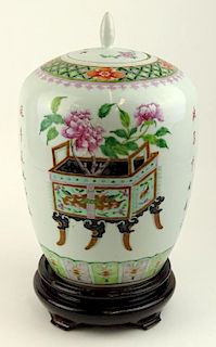 Chinese Famille Rose porcelain melon jar with calligraphy on carved wood base.