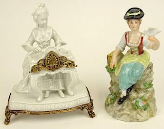 Lot of two (2) Capodimonte porcelain figurines "Girl With Dove", "Playing Tunes"