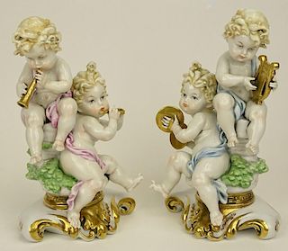Pair of Vintage Capodimonte Pucci Porcelain Figurines. "Chubby Cherubs Making Music"