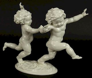Vintage white Hutschenreuther figural porcelain group. "Playful Cherubs"
