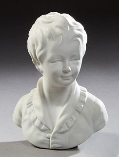 Continental White Porcelain Bust of a Young Boy, 20th c., in a collared shirt, the underside impressed with "C. Tharaud, France," H....