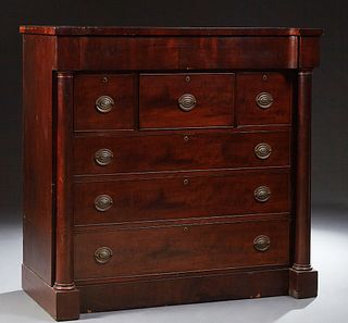 Unusual English Carved Mahogany Manor House Chest, c. 1870, the shaped concave top over a concave frieze drawer, above a center fall...