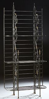 French Style Cast Iron and Brass Baker's Rack, 20th c., with three rounded slatted shelves, on scrolled supports to cylindrical legs...
