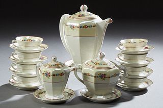 Twenty-Six Piece French Limoges Porcelain Coffee Service, 20th c., by "S.A.," consisting of 12 cups, 11 saucers, a coffee pot, cream...