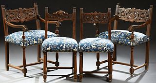 Set of Four French Henri II Style Carved Beech Dining Chairs, 19th c., consisting of two armchairs and two side chairs, each with a...