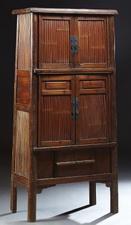 Chinese Bamboo and Elm Kitchen Cabinet, early 20th c., the rounded edge rectangular crown over double bamboo mounted upper cupboard...