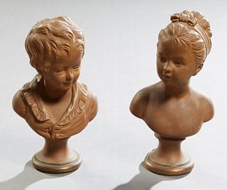 Pair of Ceramic Busts of Children, early 20th c., on gilded border socle supports, H.- 9 in., W.- 5 in., D.- 3 in.