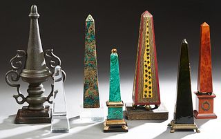 Group of Seven Obelisks, 19th and 20th c., consisting of a faux malachite example; a brass mounted black ceramic example; an iron ex...