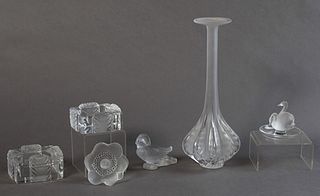 Group of Six Pieces of Lalique Crystal, 20th c., consisting of an "Anemone Ouvert" ornament; a tall bulbous vase designed by Marie-C...