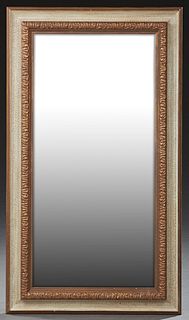 Contemporary Polychromed Mirror, 21st c., with a gilt and gesso polychromed frame around a beveled rectangular plate, H.- 33 in., W....