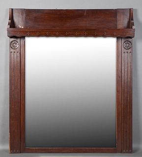 French Provincial Carved Oak Overmantel Mirror, late 19th c., the rectangular back over an open shelf above a wide beveled rectangul...