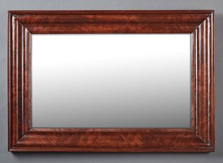 American Ogee Mahogany Mirror, 20th c., with a wide frame, H.- 26 1/8 in., W.- 37 7/8 in., D.- 2 1/4 in.
