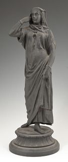 Ebonized Spelter Standing Female Figure, early 20th c., on an integral stepped circular base, H.- 14 1/2 in., Dia.- 5 1/4 in.