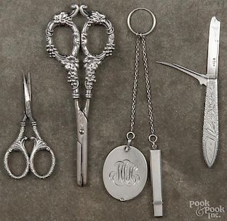 Two German silver handled grape shears, together with a pocket knife and a pencil case
