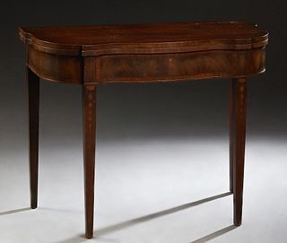English Inlaid Mahogany Hepplewhite Style Games Table, 20th c., the serpentine bowed top over a wide skirt, on tapered square legs,...