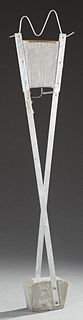 Mid Century Modern Aluminum Floor Lamp, 20th c., on a concrete block base, H.- 78 1/2 in., W.- 18 in., D.- 5 in.