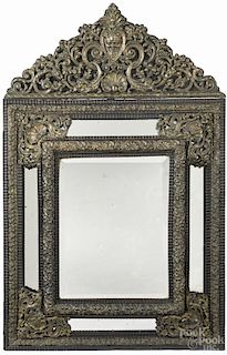 Continental ebonized and embossed brass mirror, mid 19th c., 45 1/2'' x 28 1/2''.