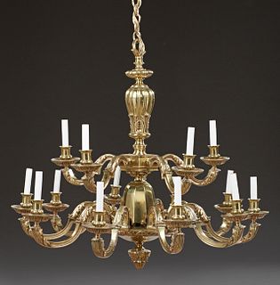 Louis XV Style Fifteen Light Bronze Chandelier, 20th c., with a baluster relief support to a pentagonal support issuing five scrolle...