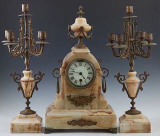 Rare Boston Clock Co. Tandem Wind Spelter and Onyx Three Piece Clock Set, c. 1900, the arched urn surmounted time and strike clock w...