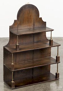 Softwood hanging shelf, late 19th c., with brass columns, 34'' h., 24'' w. Provenance: DeHoogh Gallery