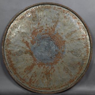 Large Moroccan Copper Tray, 20th c., with incised decoration and an everted rim, H.- 1 1/8 in., Dia.- 49 in.