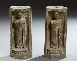 Pair of Oriental Hexagonal Carved Stone Columns, 20th c., the sides with deep relief carved figures of Buddha, H.- 15 in., Dia.- 6 1...