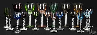 Eighteen pieces of colored glass rope twist stemware.