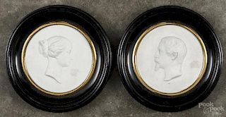 Pair of Sevres porcelain plaques of Napoleon III and his wife, 3 1/8'' dia.
