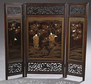 Chinese Three Panel Table Screen, 19th c., with pierce carved tops with birds and leaves, over gilt decorated black lacquer panels w...