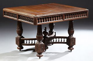 French Provincial Henri II Style Carved Oak Dining Table, c. 1880, the carved rounded edge and corner top over a spindled skirt on l...