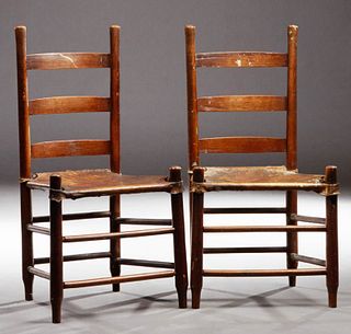 Pair of Louisiana Raw Hide Ladderback Plantation Chairs, 19th c., the turned finial supports joined by horizontal splats, over stret...