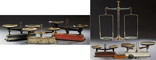 Six French Balance Scales, 19th c., consisting of five cast iron double beam balance scales and a large brass and iron balance scale...