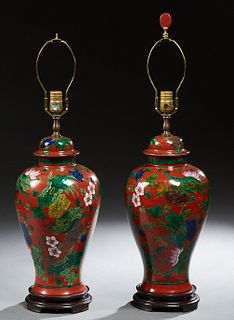 Large Pair of Oriental Porcelain Cover Baluster Ginger Jar, 20th c., with floral and leaf decoration on a read ground, now on steppe...