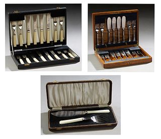 Three English Silverplated Fish Sets, early 20th c., consisting of a 16 piece fish service, c. 1930, 8 knives and 8 forks, in the or...