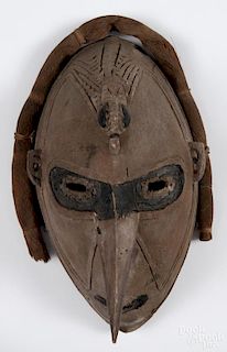 Papua New Guinea carved and painted Sepik face mask, 15'' h. Provenance: DeHoogh Gallery, Philadelphia