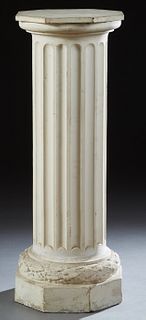 French Polychromed Beech Pedestal, 19th c., the octagonal top over fluted sides, to a stepped leaf carved support on an octagonal pl...