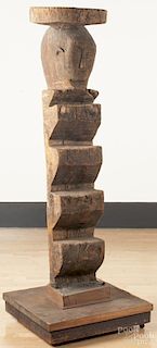 African carved wood shaman's ladder with a stand, 79'' h. Provenance: DeHoogh Gallery, Philadelphia.