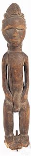 African carved male spirit figure, by the Baule people of the Ivory Coast, 15'' h.