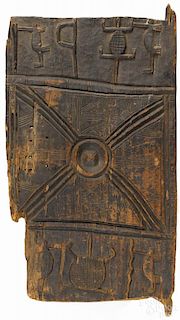 African Senufo tribe carved wooden granary door panel with geometric and animal designs, 47'' h.