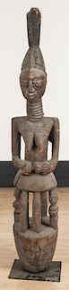 Yoruba carved house post, 60'' h. Provenance: DeHoogh Gallery, Philadelphia.